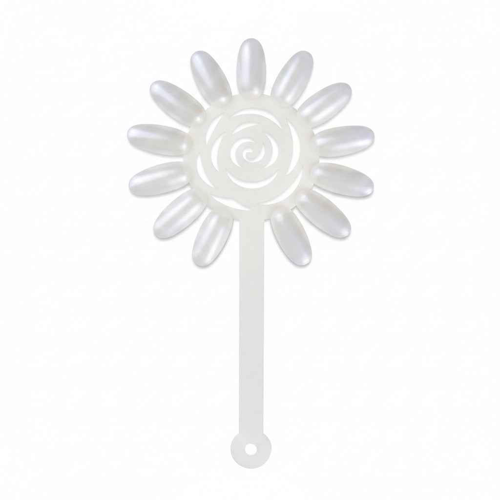 White sunflower-shaped object on a white background